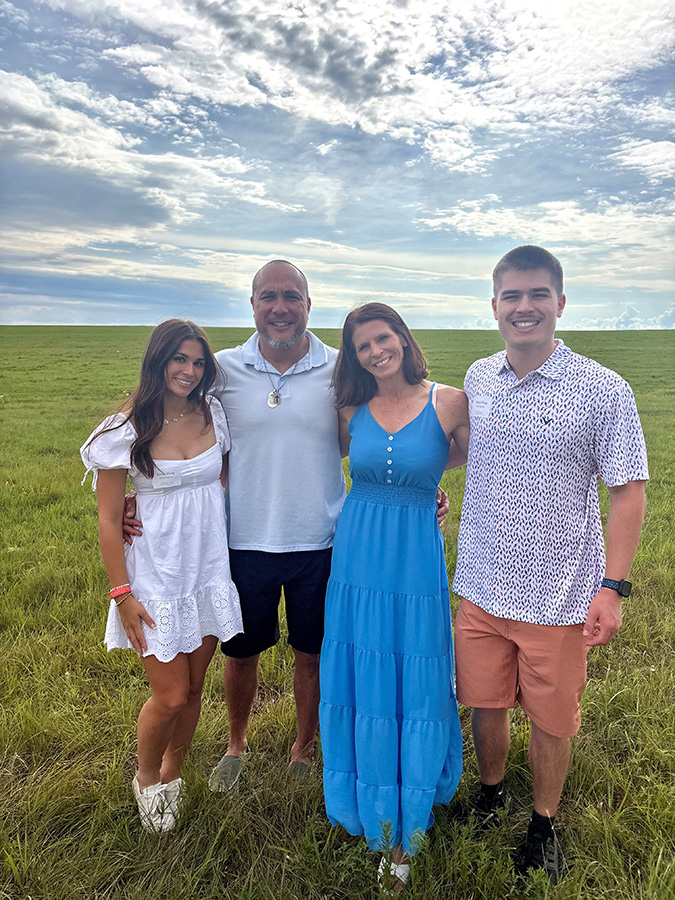 George with his wife, Kristin, and their children Emma and Hunter